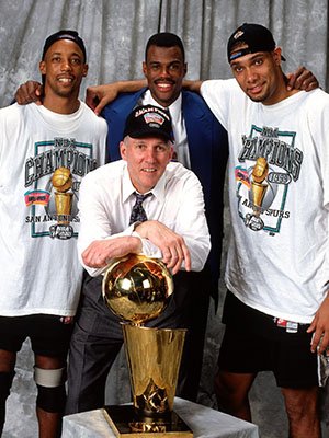 Gregg Popovich, Tim Duncan, David Robinson, and Sean Elliott with Spurs 1999 NBA title