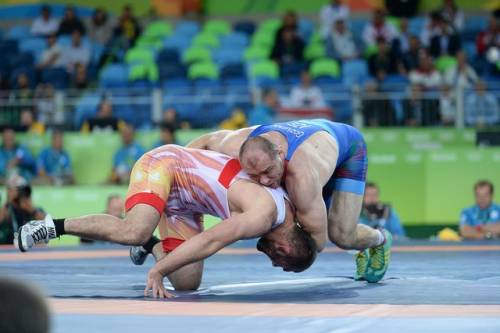 Azerbaijan's Khetag Gazyumov faces Uzbekistan's Magomed Ibragimov in Wrestling at the 2016 Summer Olympics