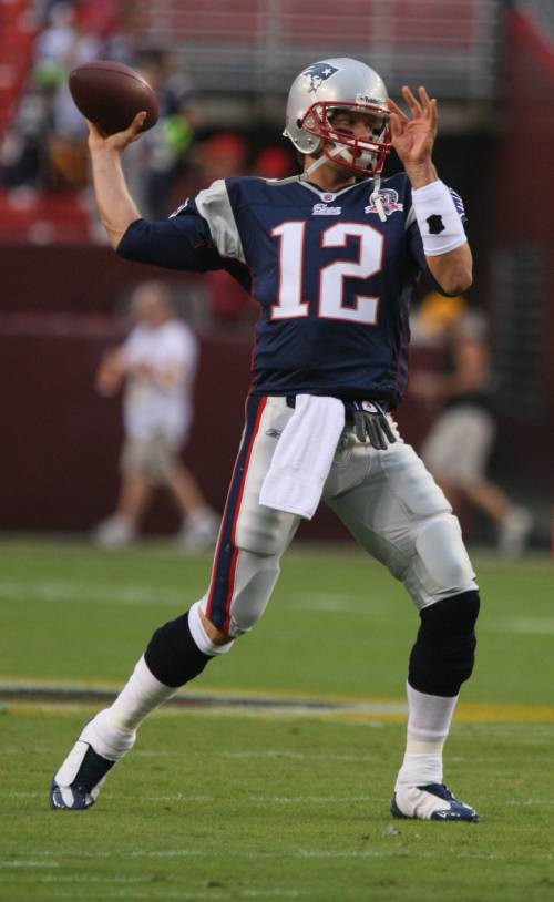 Tom Brady playing for the New England Patriots