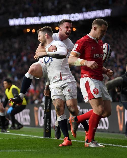 England's Elliot Daly and George Ford celebrate after a scoring a try