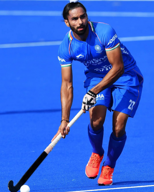 Akashdeep Singh passing in hockey, playing for India