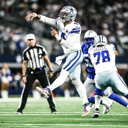 Dak Prescott throwing the ball.