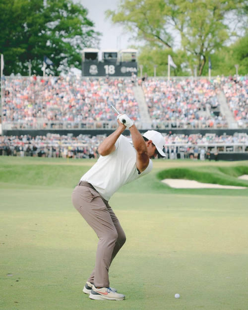 Brooks Koepka hitting the ball.