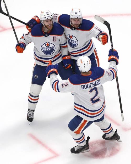 Edmonton Oilers players celebrating.