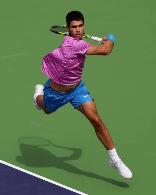 Carlos Alcaraz playing tennis