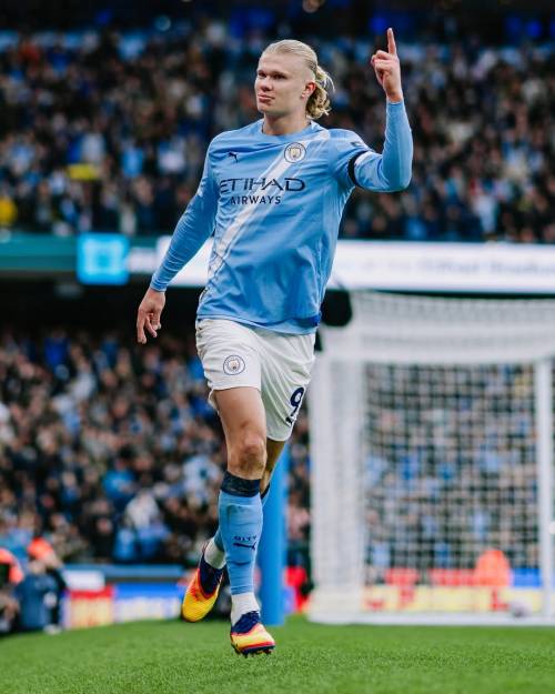 Erling Haaland celebrates after scoring for Manchester City