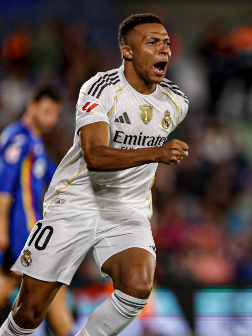 Kylian Mbappé Kylian Mbappé celebrates after scoring for Real Madrid